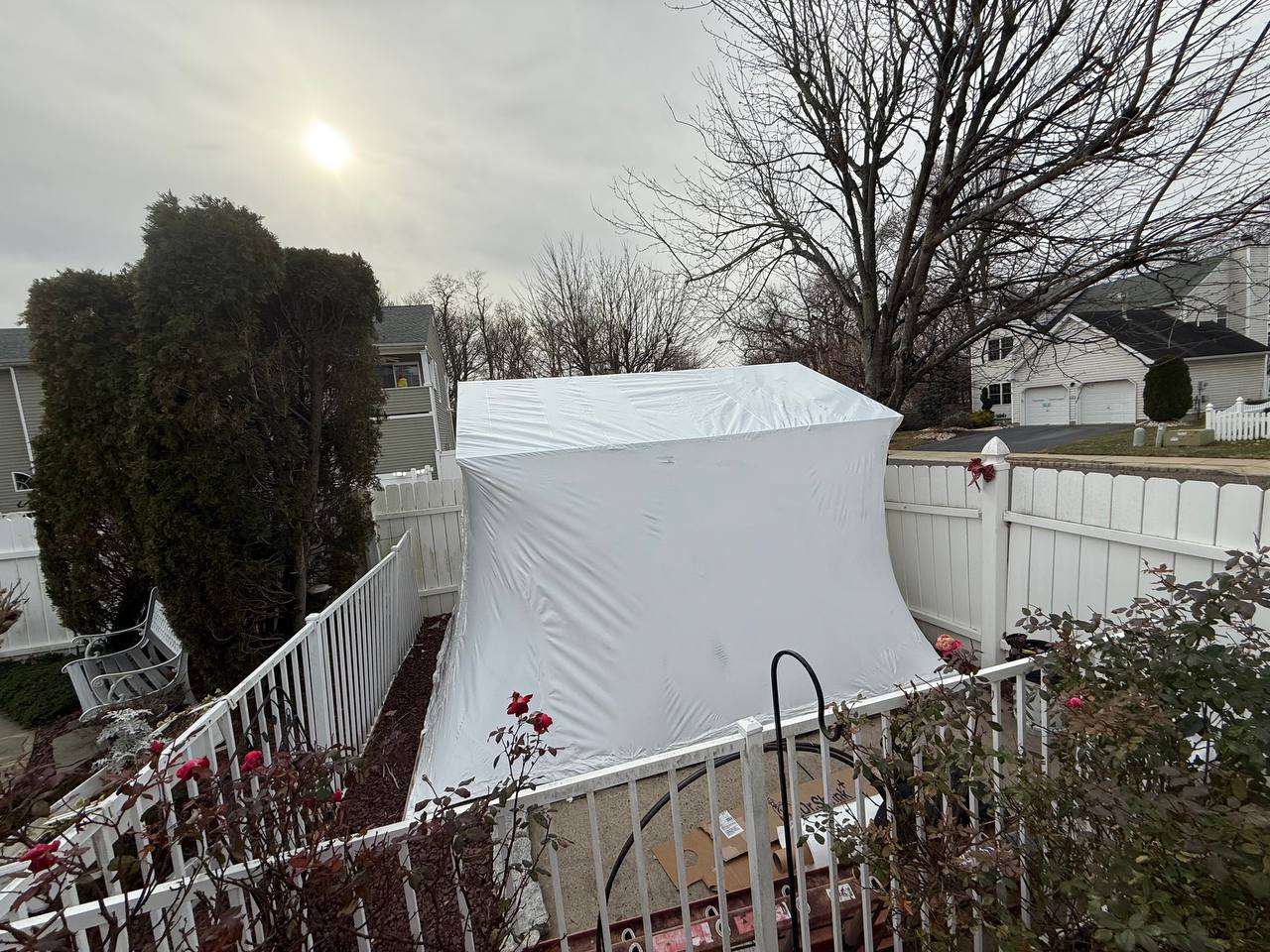 Backyard structure fully shrink wrapped