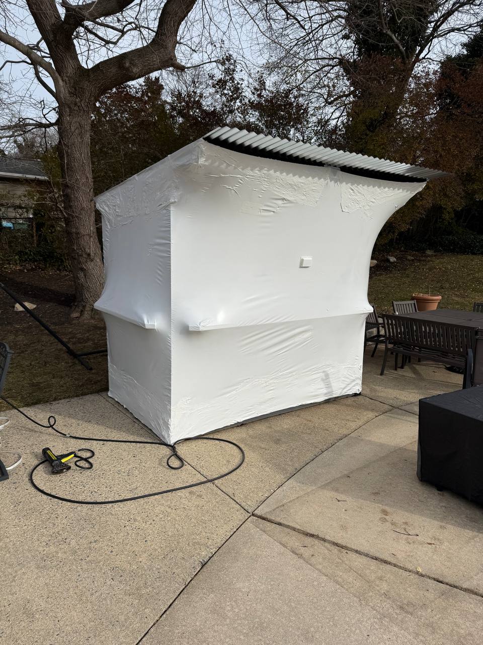 Outdoor tiki bar shrink wrapped